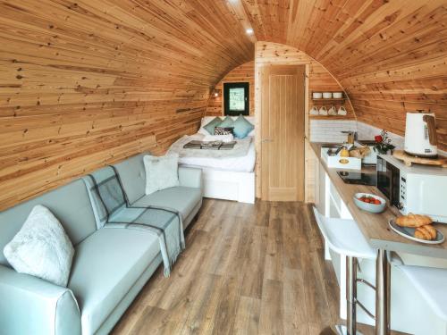 a living room and kitchen in a tiny house at Arran - Uk48415 in Dalry