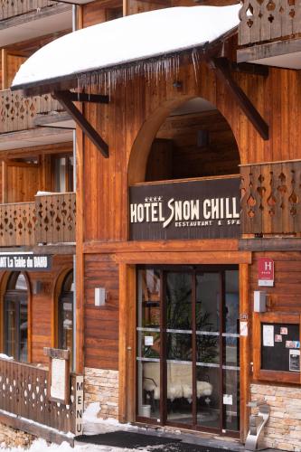 a building with a sign that reads hotel snow chill at Hotel SNOW CHILL in Risoul