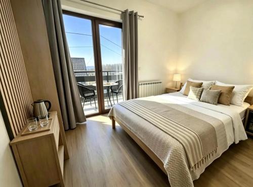 Llit o llits en una habitació de Guesthouse Pavlin