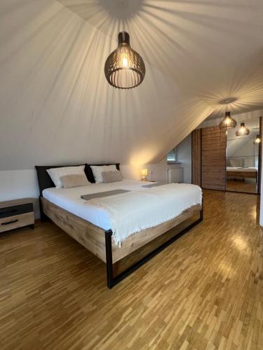 a bedroom with a large bed in a tent at Rezidenca Vista Lux in Ptuj
