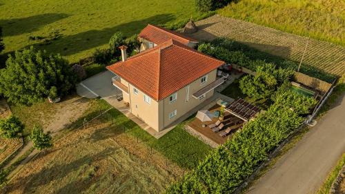 an overhead view of a house with a red roof at Just Like Home - Casa Antonio em Paredes de Coura in Paredes de Coura