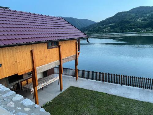 a house with a view of a lake at Lure House in Mali Zvornik