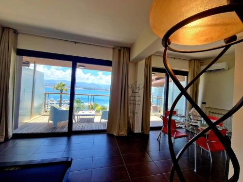 a living room with a view of the ocean at Milazzo. Intero alloggio in affitto in Milazzo