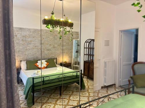a bedroom with a swing bed in a room at Gemma Del Sud - Centro Storico in Conversano
