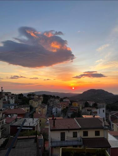 a view of a city at sunset at Sa Omu 'e Pinucciu in Lanusei