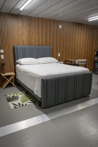 a bedroom with a large bed in a room at Cocles Green Studios in Cocles