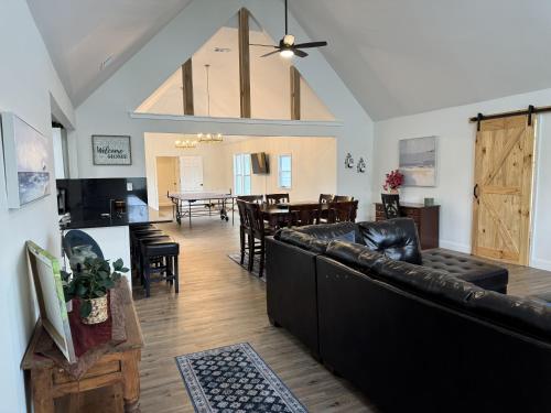 a living room with a couch and a dining room at Charming Room in Martinez in Martinez
