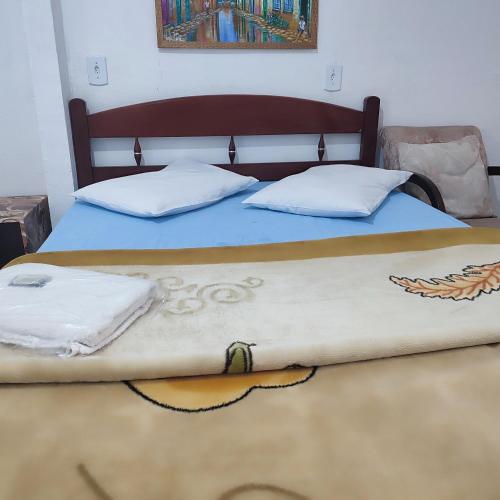 Postel nebo postele na pokoji v ubytování Minha casa pousada
