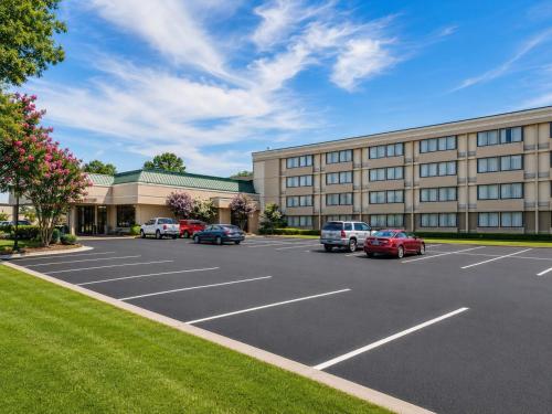 a parking lot in front of a hotel at Gardentree Hotels Memphis East near I 40 in Memphis