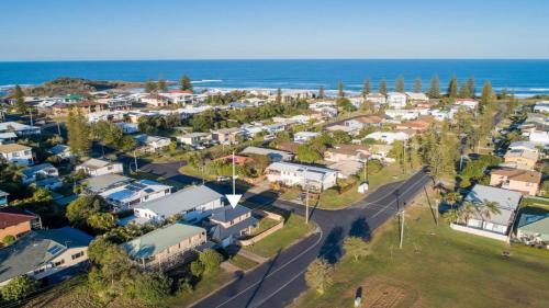 an aerial view of a small town by the ocean at Yamba Beach House - Lifestyle Yamba in Yamba