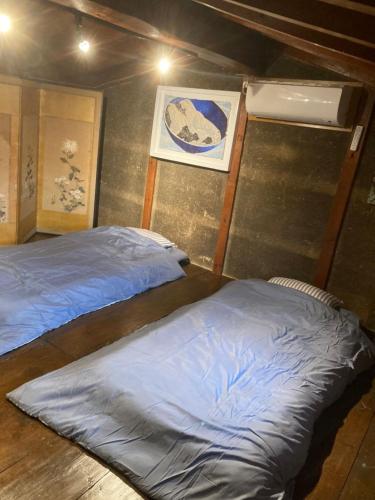 a room with two beds in a room with at base sanablend - Vacation STAY 04909v in Kyotango