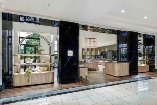 a store with a store front with counters in a building at Hotel Trusty Tokyo Bayside in Tokyo