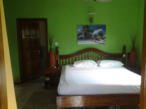 Voodi või voodid majutusasutuse Villa Creole toas
