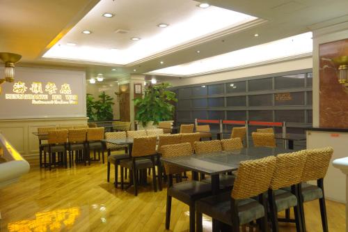 En restaurant eller et andet spisested på Macau Masters Hotel