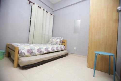 Postel nebo postele na pokoji v ubytování Putra Harmoni Putrajaya (Tiny Suite, 3 AC Bedrooms, 1 Bath, WiFi, Ground Floor) by MRK