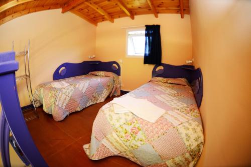 Postel nebo postele na pokoji v ubytování Albergue Finca El Mazo