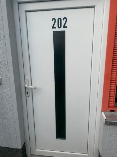 a door with the number twentytwo on it at Apartment 202 in Bernau bei Berlin