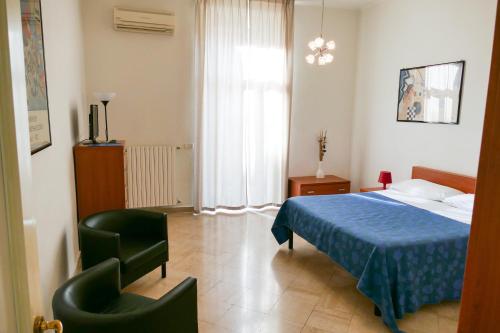 Postel nebo postele na pokoji v ubytování Visa Residence