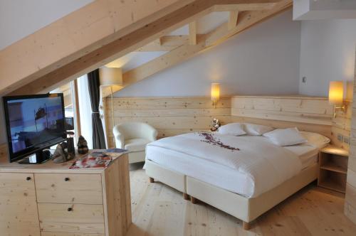 Chalet Laura Lodge Hotel 객실 침대