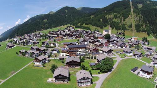 an aerial view of a village on a mountain at Klammer Gabi in Obertilliach
