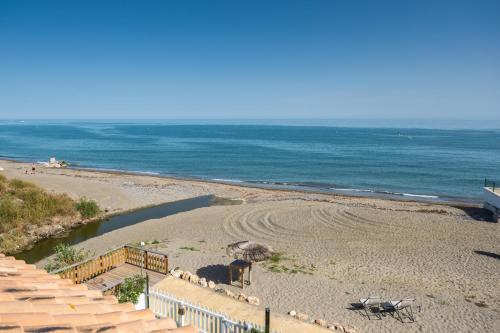 Estepona Beachfront Garden by Libehomes