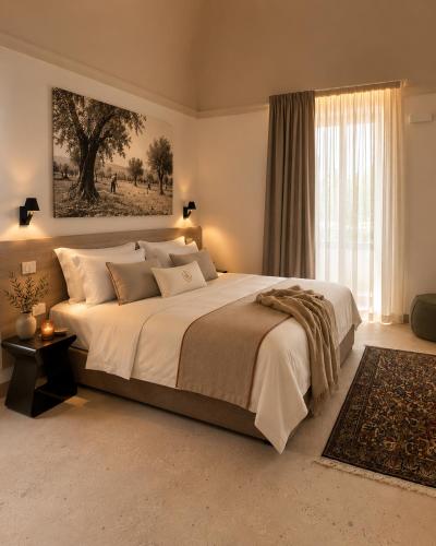 a bedroom with a large bed and a large window at Villa ArboreA in Squinzano