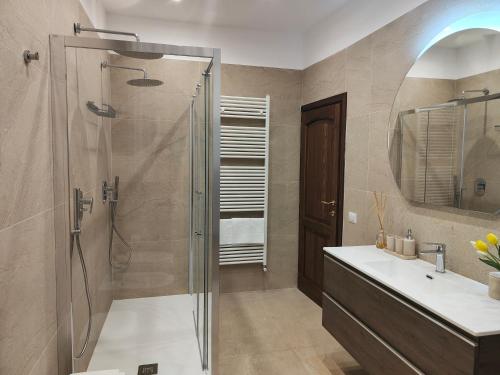a bathroom with a shower and a sink at Casale Le Sette Vene in Mercatale