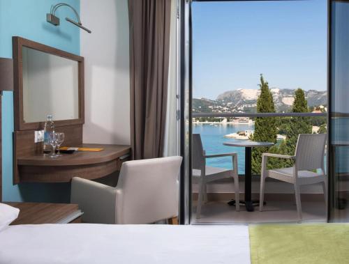 a hotel room with a view of the water at Maistra Select Astarea Hotel in Mlini