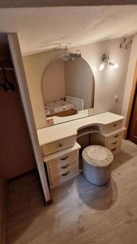 a dressing room with a vanity and a mirror at Jūrmala beach in Jūrmala