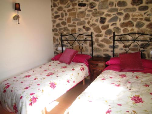 Postel nebo postele na pokoji v ubytování Casa Rural La Altanera