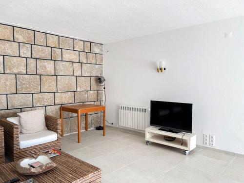1-bedroom apartment with private pool next to the beach