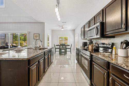 5BR Pool Home-Spa-Epic Game Room Near Disney photo 4