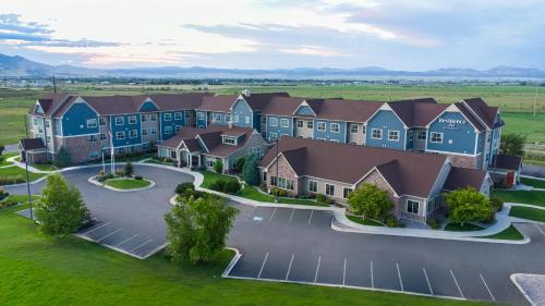 an aerial view of a building with a parking lot at Residence Inn by Marriott Helena in Helena