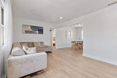 a living room with a couch and a table at LA Gramercy in Los Angeles