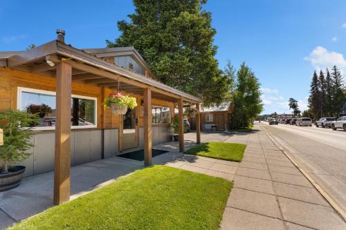 a house on the side of a street at The Evergreen in West Yellowstone