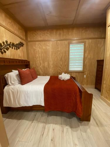 a bedroom with a bed and a window at Tiny Home in Lawrenceville in Lawrenceville