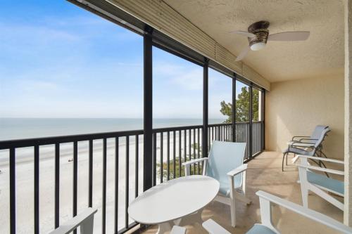 a balcony with a view of the ocean at Luxury Oceanfront Penthouse Condo in Clearwater Beach