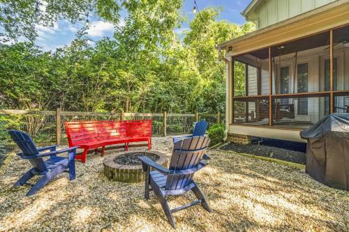 a patio with two chairs and a red bench at Musician's Ranch in Franklin