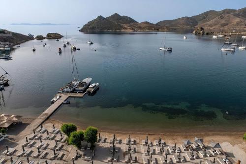 an aerial view of a marina with boats in the water at Patmos Aktis, a Luxury Collection Resort & Spa, Greece in Patmos