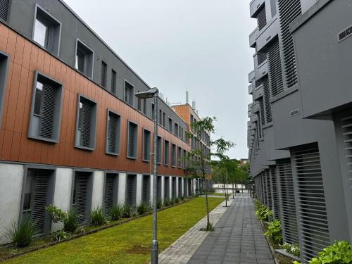 an empty street in a city with buildings at Curraheen Point Cork - Easy Access to City Centre in Cork