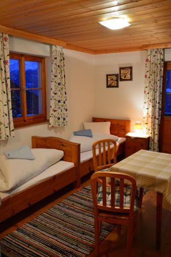 Postel nebo postele na pokoji v ubytování Haus Kathrein