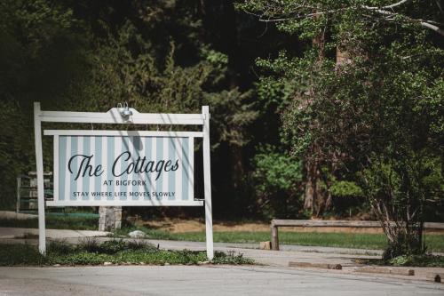 a sign for the entrance at a park at The Cottages at Bigfork in Bigfork