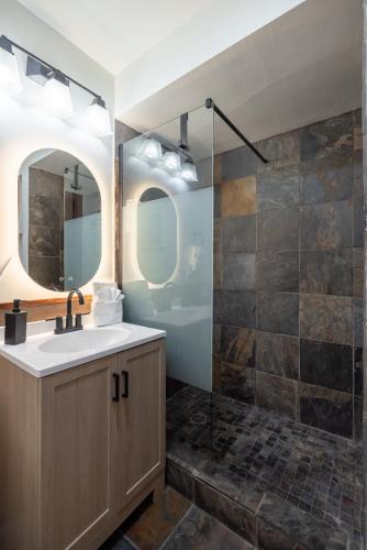 a bathroom with a sink and a shower at The Iceberg Tahoe in South Lake Tahoe