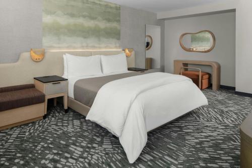 a rendering of a bedroom with a large bed at The Westin Cleveland Downtown in Cleveland