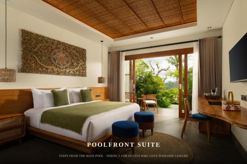a hotel room with a bed and a balcony at ULU Valley Retreat in Tegalalang