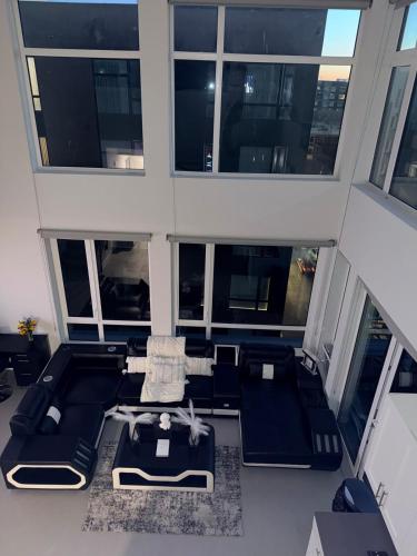 an overhead view of a living room with couches and windows at Moonlit Serenity 2 in Oakland
