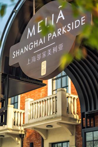 a sign for mella shanghaiparks in front of a building at Meliá Shanghai Parkside in Shanghai