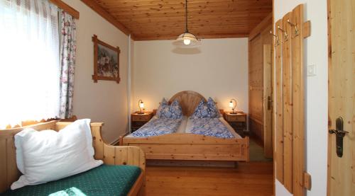 Giường trong phòng chung tại Ringlerhof