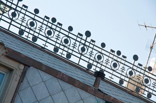 a building with a line of speakers on the roof at Hotel Di Varese in Varese