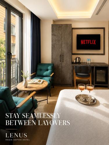 a living room with two chairs and a table at Lenus Hagia Sophia Hotel in Istanbul